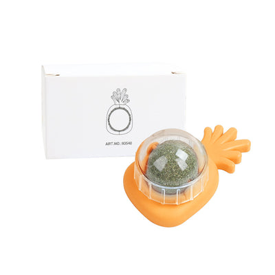 Orange carrot-shaped cat toy with a clear dome holding a rotating catnip ball, next to its white packaging box. - Image 3