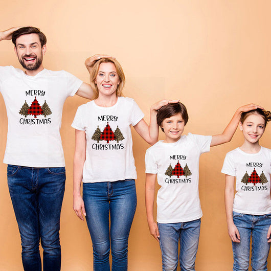 Family matching white Christmas t-shirts and baby bodysuit with 'Merry Christmas' graphic, paired with black and white plaid pajama bottoms. - Image 16