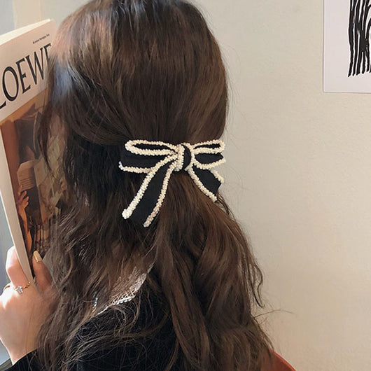 Diadema Elegante con Moño Blanco y Detalles Perlados - Image 4