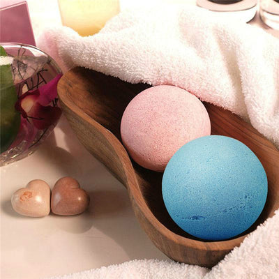 A single, round, light green bath bomb with a slightly textured surface, ready for a relaxing bath. - Image 3