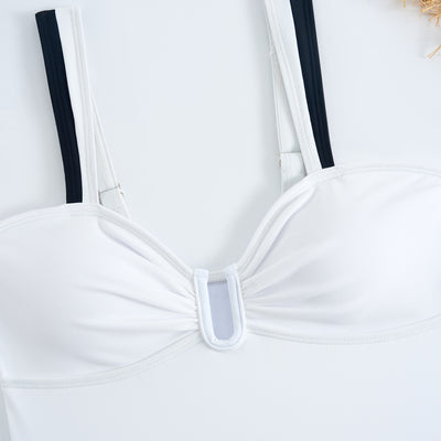 White one-piece women's swimsuit with black side panels and straps, featuring a ruched bust and U-shaped detail. - Image 37