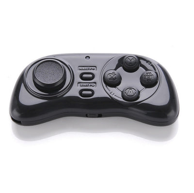 Black portable mini Bluetooth smart gamepad with an analog stick and four action buttons for mobile gaming. - Image 3