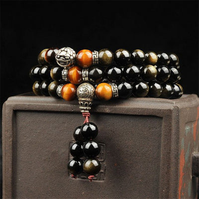 Pulsera de Obsidiana Dorada con 108 Cuentas Buda y Plata Tibetana - Image 7