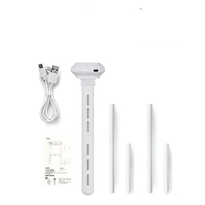 White USB humidifier with a long body, flat top, two cotton swabs, and an instruction manual on a white background. - Image 6