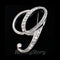 English letter brooch with diamonds G