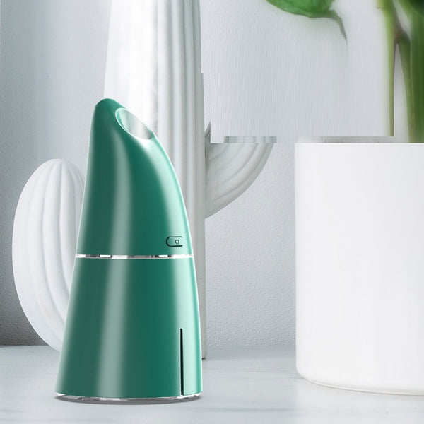 Red columnar USB mini humidifier with a power button and top mist outlet, designed for small spaces.