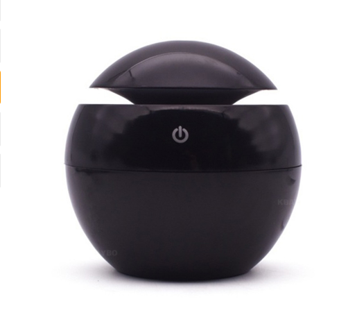 Black spherical ultrasonic atomizer with a power button icon, designed for aromatherapy and humidification. - Image 9