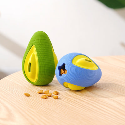 Green and yellow avocado-shaped rubber dog chew toy with a textured surface and a treat dispensing slot. - Image 9