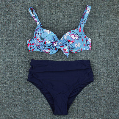 Olive green floral print bikini top with tie-front and solid high-waisted ruched bottoms on a grey background. - Image 14