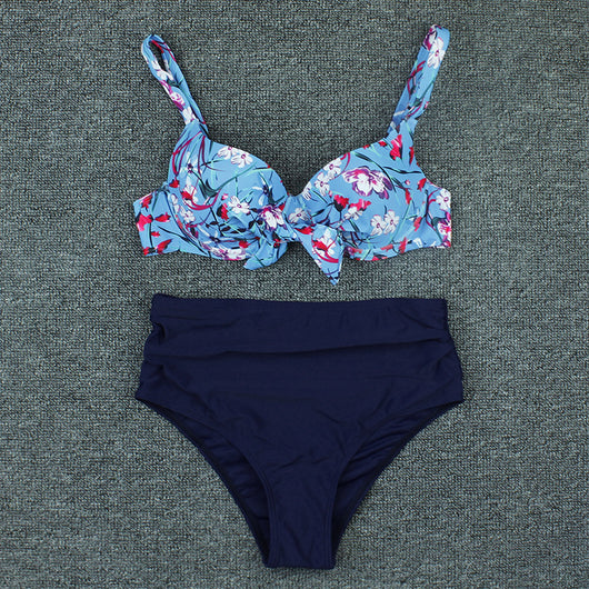 Olive green floral print bikini top with tie-front and solid high-waisted ruched bottoms on a grey background. - Image 14