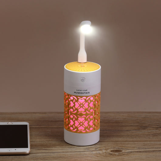 Light blue and white Lucky Cup humidifier with a decorative heart and floral cutout pattern. Features a power button. - Image 5
