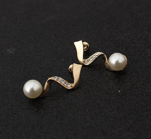 White pearl necklace and matching stud earrings set with gold-tone wavy metal and clear crystal accents. - Image 3