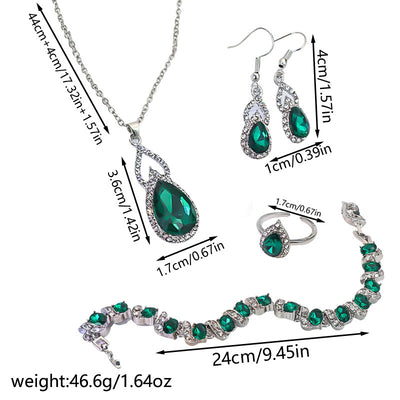 Light luxury jewelry set with silver-tone necklace, dangle earrings, open ring, and bracelet, all featuring emerald green teardrop and oval stones with clear rh - Image 10