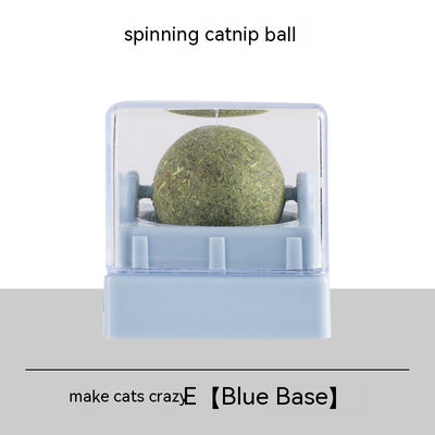 Two spinning catnip balls, one with a green base and one with a blue base, in clear plastic cases. - Image 3