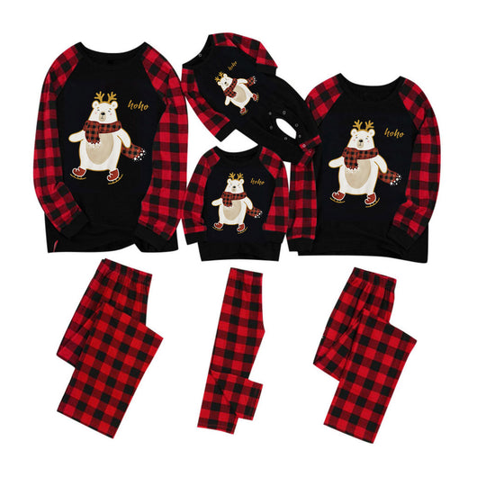 Kids' Christmas pajamas with a black long-sleeve top featuring a cartoon bear in a plaid scarf and ice skates, paired with red and black plaid pants. - Image 14