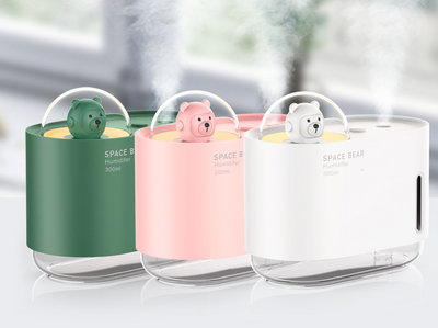 White square humidifier with a clear base, featuring a cute white bear figure in a clear dome, labeled "SPACE BEAR Humidifier 300 ml". - Image 9