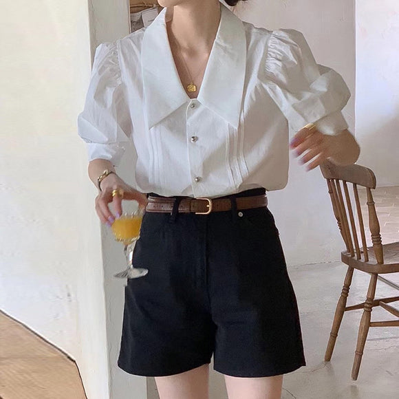 Blusa Elegante con Escote en V y Mangas Abullonadas