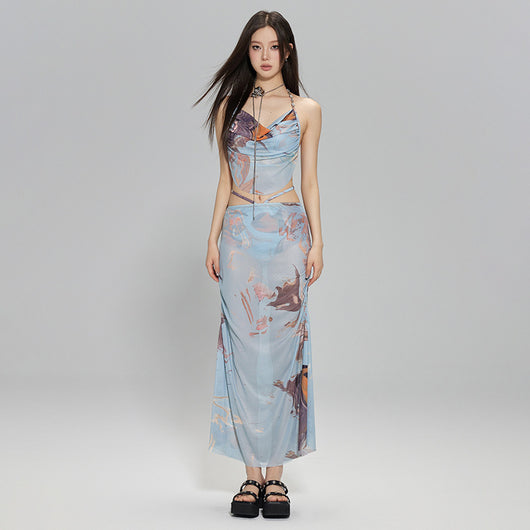 Light blue abstract print two-piece bikini set with a cropped halter top featuring chain straps and a ruched maxi skirt. - Image 3