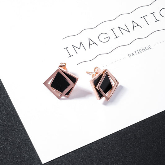 Aretes de Acero Titanio Geométricos con Borlas - Diseño Moderno y Versátil