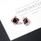 Aretes de Acero Titanio Geométricos con Borlas - Diseño Moderno y Versátil