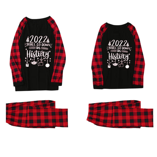 White long-sleeve pajama top with "wild one" graphic and red and black plaid pants. - Image 9