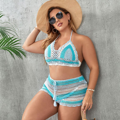 Woman in a blue and white striped crochet two-piece swimsuit with a halter top and high-waisted shorts. - Image 14
