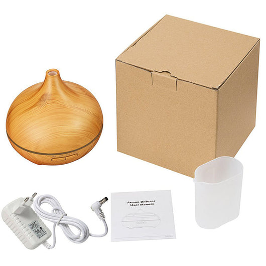Wood grain ultrasonic aromatherapy diffuser and humidifier with a glowing blue LED light band and control buttons. - Image 4