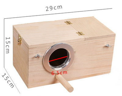 Light-colored wooden birdhouse with a circular silver metal entrance, a wooden perch, and brass-colored hardware. - Image 9