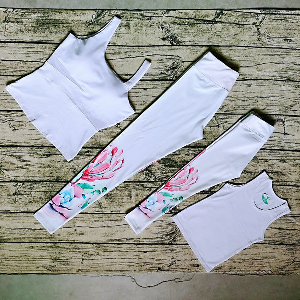 Parent-child dance fitness yoga suit with black tank tops and vibrant pink, orange, and green striped leggings.