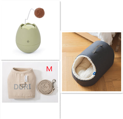 White egg-shaped automatic cat toy with a yellow interior and a flexible wire holding a yellow fuzzy ball. - Image 9