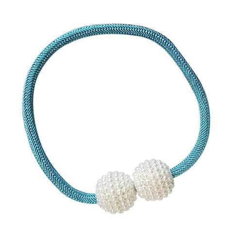 Magenta elastic curtain tieback with two white pearl-beaded spheres, designed to hold curtains elegantly. - Image 28