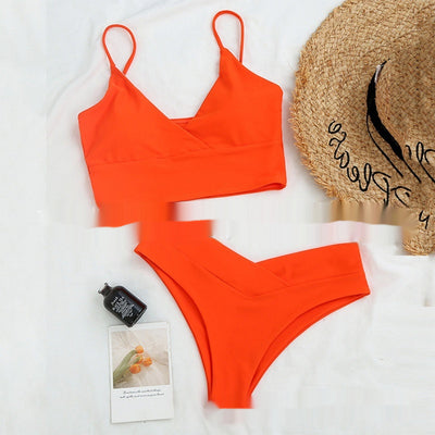 Bright yellow two-piece bikini swimsuit with a crop top and high-cut V-front bottoms, laid flat. - Image 10