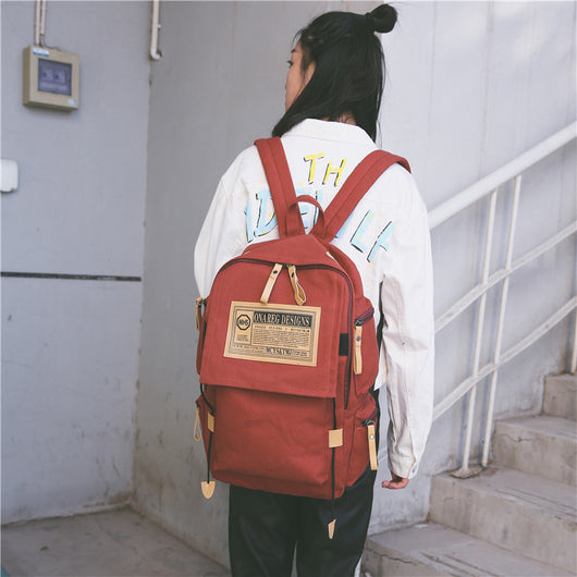 Mochila Coreana de Lona de Gran Capacidad para Viajes y Universidad - Image 15