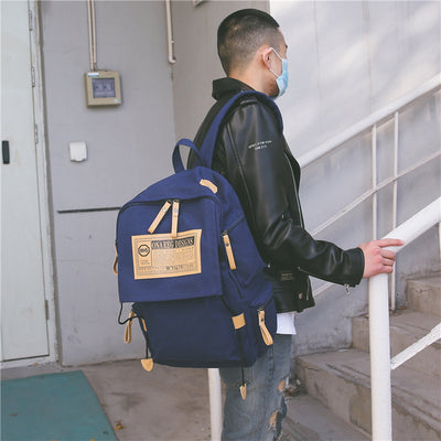 Mochila Coreana de Lona de Gran Capacidad para Viajes y Universidad - Image 10