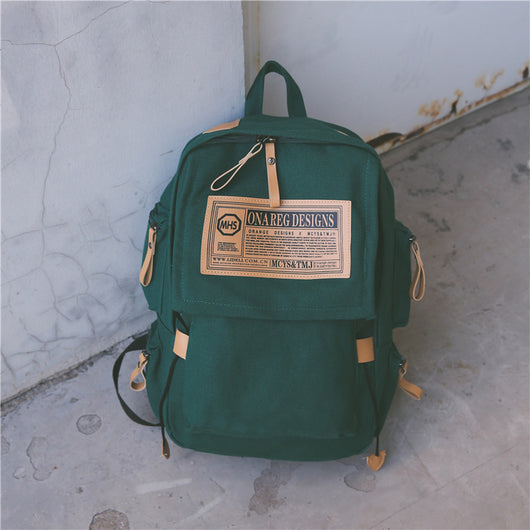 Mochila Coreana de Lona de Gran Capacidad para Viajes y Universidad - Image 9