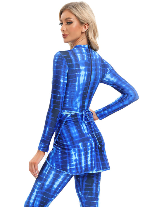 Blue tie-dye conservative beach swimsuit with long sleeves, full-length leggings, and a sheer sarong-style skirt. - Image 27