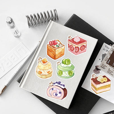 Hand holding a strawberry shortcake sticker with a tiny bunny, part of a 40-piece set of cute cartoon dessert stickers. - Image 18