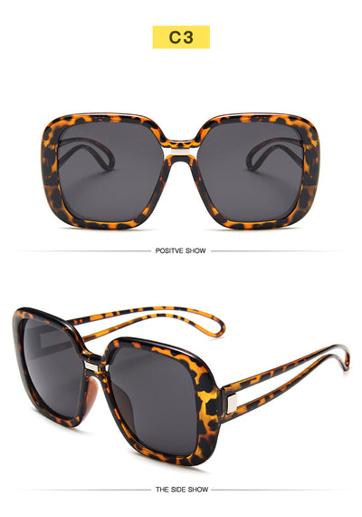 Large frame sunglasses with gradient purple lenses and a blue-to-clear fade on the bottom of the frame. - Image 16