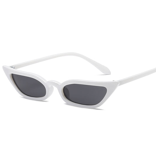 Red small frame cat-eye sunglasses with red tinted lenses on a white background.