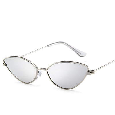Retro cat eye sunglasses for women with bright yellow lenses and a sleek silver-tone metal frame. - Image 10