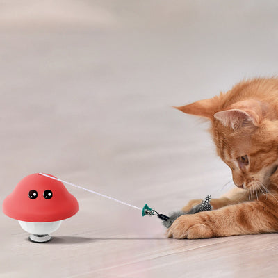 Red and white mushroom-shaped cat toy with cartoon eyes, a green loop, and a suction cup base, showing dimensions. - Image 4
