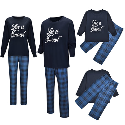 Dark blue long-sleeve pajama set with "Let it Snow!" script top and blue and black plaid pants.
