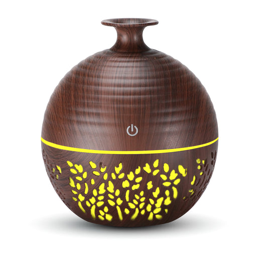 Light wood grain portable mini aroma diffuser humidifier with a vase shape and glowing blue leaf patterns. - Image 9