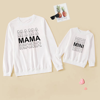 White long-sleeve adult sweater with "MAMA" text and matching child's sweater with "MINI" text. - Image 6