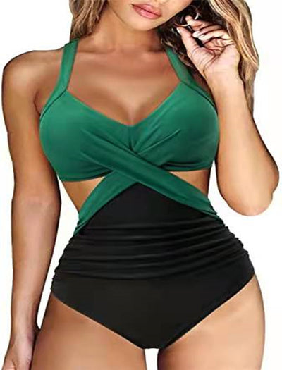 Women's teal halter bikini top with a twisted front and high-waisted bottoms featuring a blue and green tropical leaf print. - Image 9