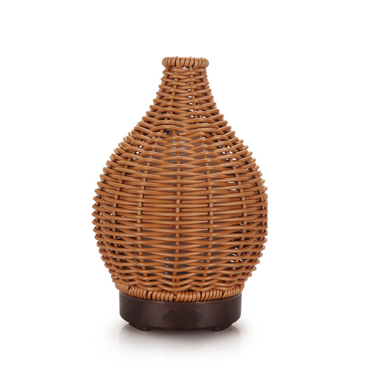 Mini ultrasonic aroma diffuser with a brown hollow rattan-style body and a white base, featuring control buttons. - Image 3