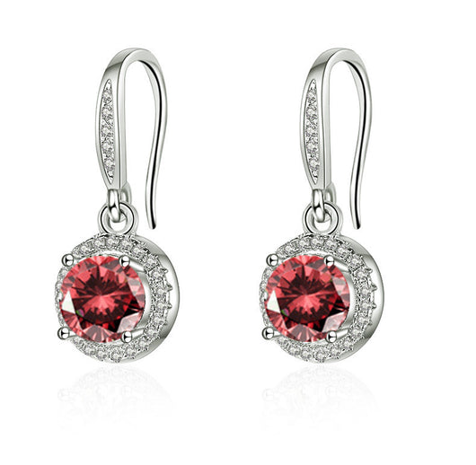 Aretes Moissanita Redondos de Cuatro Puntas - Image 9