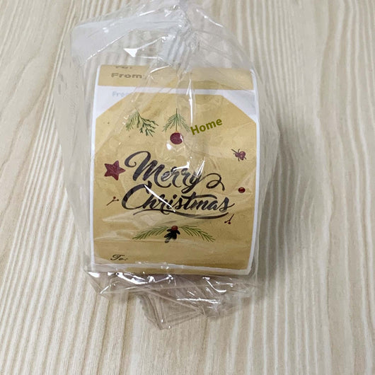 Kraft paper Christmas holiday gift sticker roll with various designs including reindeer, Christmas trees, and Merry Christmas text. - Image 11