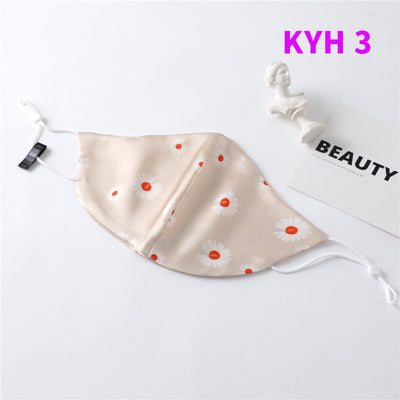 White silk face mask with light blue floral pattern and adjustable ear loops for women's sun protection. - Image 39