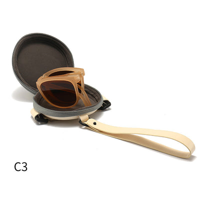 Light brown foldable women's sunglasses with round frames and brown polarized lenses on a white background. - Image 13